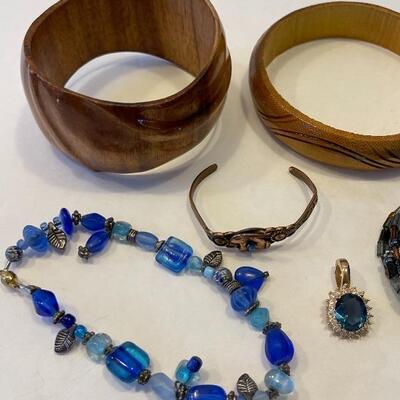 Lot 77 - (8) costume bracelets and (2) costume pendants 