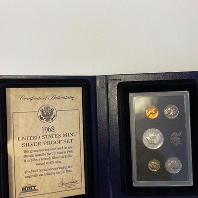 Lot 87 - 1922 peace dollar with Alexander Graham Bell stamp, 1923 Calvin Coolidge becomes president stamp, 1923 peace dollar President...