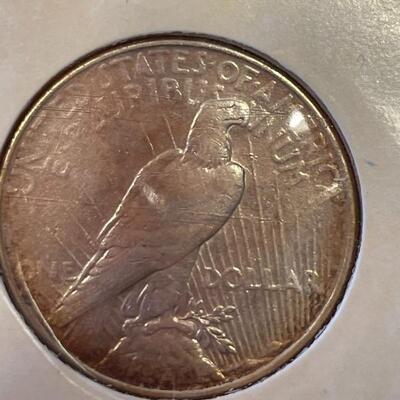 Lot 87 - 1922 peace dollar with Alexander Graham Bell stamp, 1923 Calvin Coolidge becomes president stamp, 1923 peace dollar President...