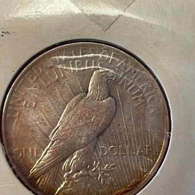 Lot 87 - 1922 peace dollar with Alexander Graham Bell stamp, 1923 Calvin Coolidge becomes president stamp, 1923 peace dollar President...