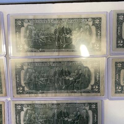 Lot 95 - lot of (4) $1 bills, lot of (7) $2 dollar bills, American heritage mint historic US coinage Washingtonâ€™s last year silver coin...