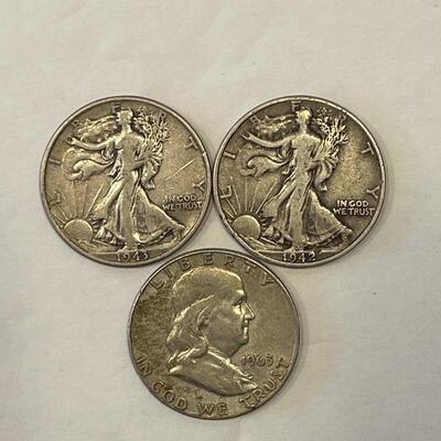 Lot 97 - 1942 liberty walking half dollar, 1943 liberty walking half dollar, 1963 Franklin half dollar