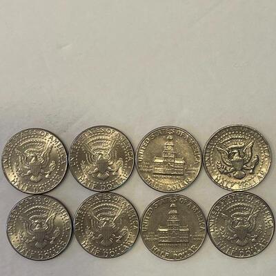 Lot 98 - Lot of (8) Kennedy half dollars