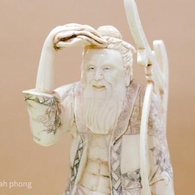 Bone Sculpture - Old Chinese Man Holding Saw 