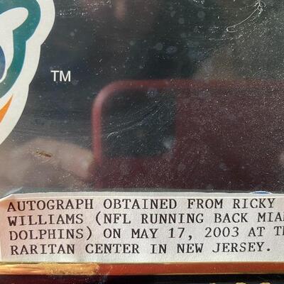 Autographed Ricky Williams Miami Dolphins Framed Poster.