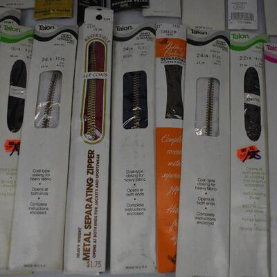 34 ZIPPERS in packaging. New Old Stock - New