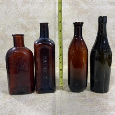 -126- VINTAGE | Four Brown/Amber Glass Bottles | Paineâ€™s