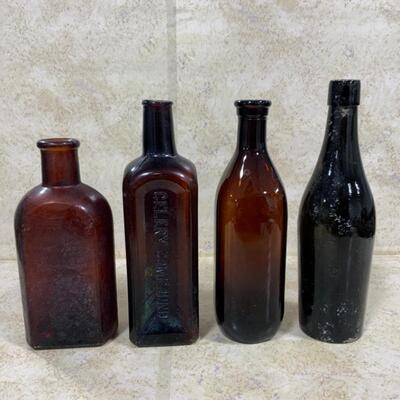 -126- VINTAGE | Four Brown/Amber Glass Bottles | Paineâ€™s