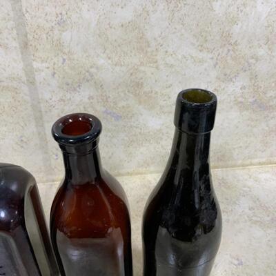 -126- VINTAGE | Four Brown/Amber Glass Bottles | Paineâ€™s