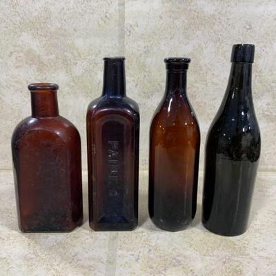 -126- VINTAGE | Four Brown/Amber Glass Bottles | Paineâ€™s