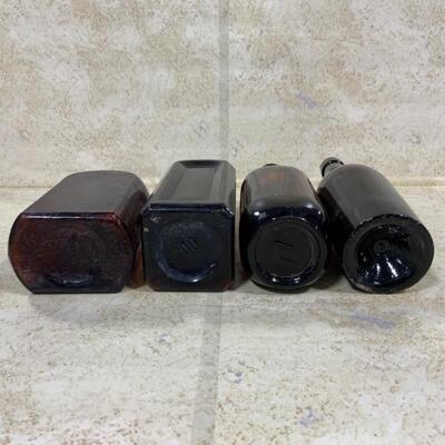 -126- VINTAGE | Four Brown/Amber Glass Bottles | Paineâ€™s