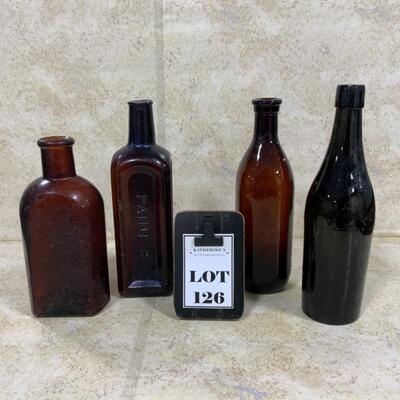 -126- VINTAGE | Four Brown/Amber Glass Bottles | Paineâ€™s