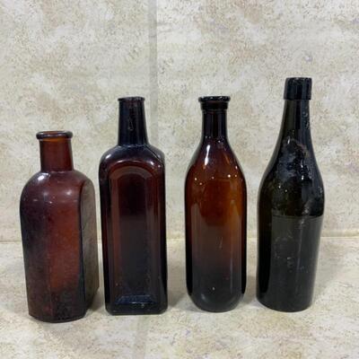 -126- VINTAGE | Four Brown/Amber Glass Bottles | Paineâ€™s