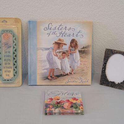 Lot 57: Sisters Books, Picture Frame and Penny Charm Plaque 