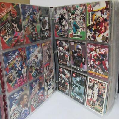 2 Binders Almost Full of Football Cards, 1 Binder Has 85 Pages, the Other Has 41 Pages. Read description for more details