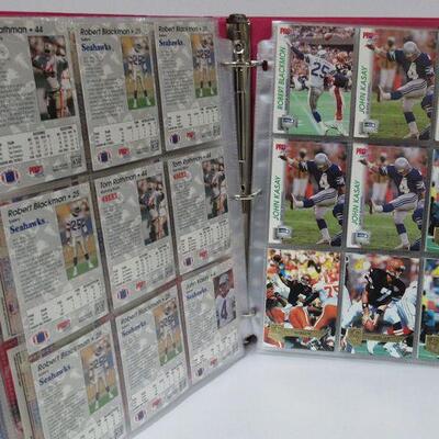 2 Binders Almost Full of Football Cards, 1 Binder Has 85 Pages, the Other Has 41 Pages. Read description for more details