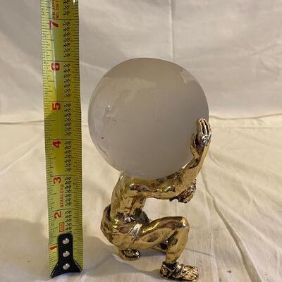 Brass and glass Atlas statue 