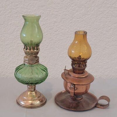 Lot 75: Small Oil Lamps - Brass with Green Glass & Copper with Amber Glass