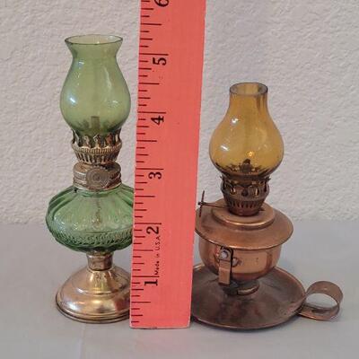 Lot 75: Small Oil Lamps - Brass with Green Glass & Copper with Amber Glass