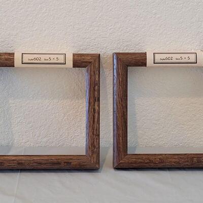 Lot 85: (2) 5 Ã— 5 Wood Picture Frames