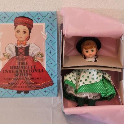 Lot 131: Madame Alexander Ireland Doll and Paper Dolls