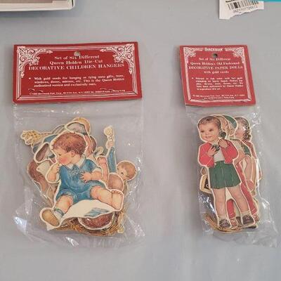 Lot 156: Baby Albums, Pull Toy and Gift or Hanging Deco Tags