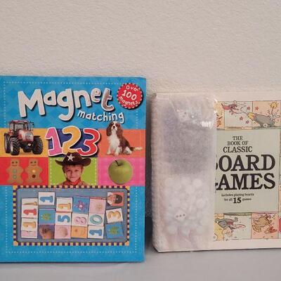 Lot 198: Child Activity Book & Older Youth/Adult Board Games Book