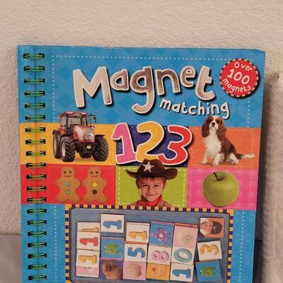 Lot 198: Child Activity Book & Older Youth/Adult Board Games Book