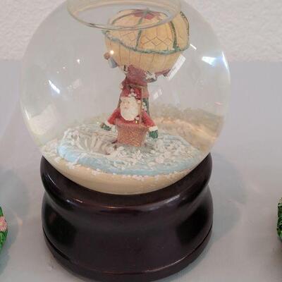 Lot 201: (3) Smithsonian Institute Water Globes