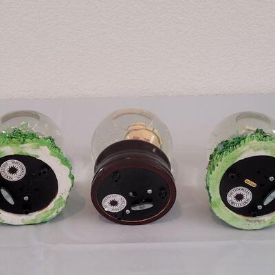 Lot 201: (3) Smithsonian Institute Water Globes