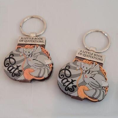 Lot 212: Keychains - 2 Cat Notepad, Cat Pouch and Fish 