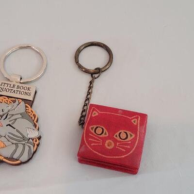 Lot 212: Keychains - 2 Cat Notepad, Cat Pouch and Fish 