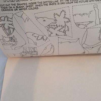 Lot 237: (2) Vintage Coloring Books (one has a couple pages colored)