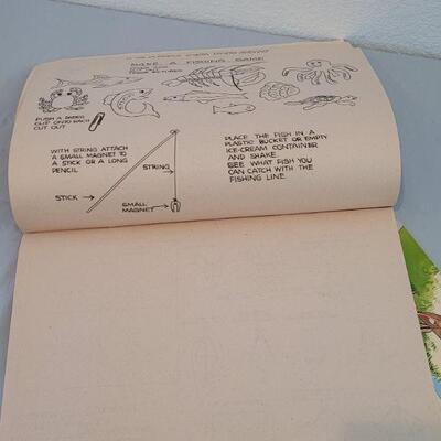 Lot 237: (2) Vintage Coloring Books (one has a couple pages colored)