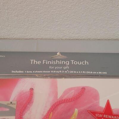 Lot 243: Gift Bag Sets, Wrapping Paper, Gift Trim and Tissue Paper 