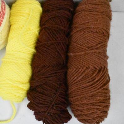 7 Skeins of Yarn: Browns, Yellow, Blue, Cream