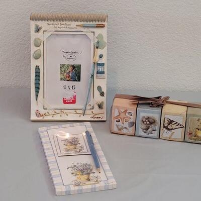 Lot 256: Marjolein Bastin Picture Frame, Notepad & Pen Set, Candles