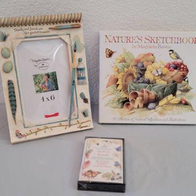 Lot 263: Marjolein Bastin Picture Frame, Tape and Book