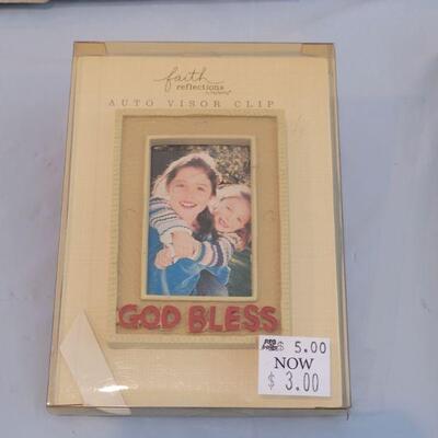 Lot 310: Religious Books and Visor Clip Frame