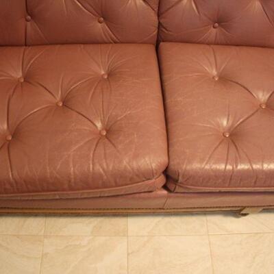 Lot #31: Vintage Mauve-Pink Leather Tufted Sofa with Wooden Knob Legs 