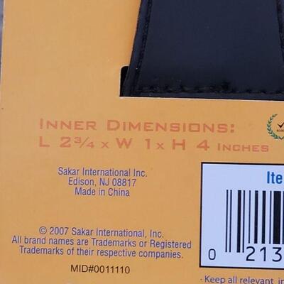 Lot 320: New Binoculars, Camera Case and Red Eye Correction Pen