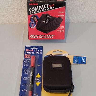 Lot 320: New Binoculars, Camera Case and Red Eye Correction Pen