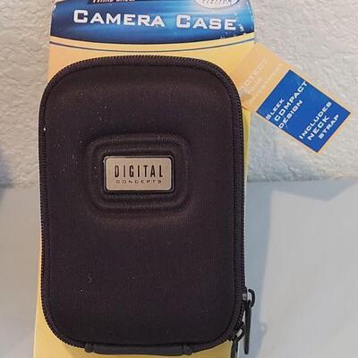 Lot 320: New Binoculars, Camera Case and Red Eye Correction Pen