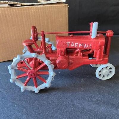 LOT#G299: Farmall Cast Tractor NOS