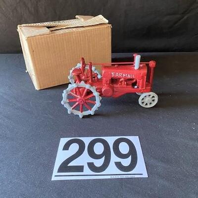 LOT#G299: Farmall Cast Tractor NOS