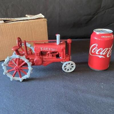 LOT#G299: Farmall Cast Tractor NOS