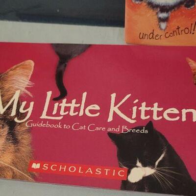 Lot 37: Assorted New CAT THEME Collectibles - Books and Magnets