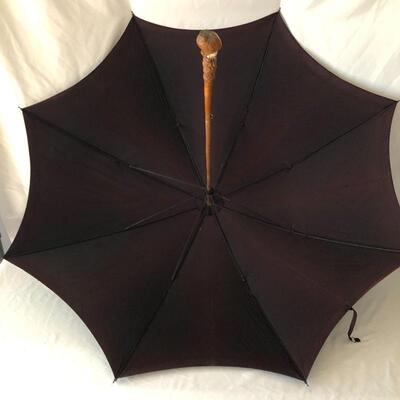 Lot 32 - Pair of Carved Handled Umbrellas 