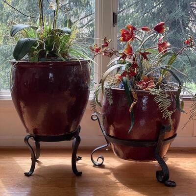 Lot 49 - Two Red Planters with Faux Floral & Metal Stands