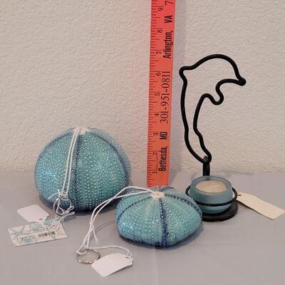 Lot 117: (2) New Sea Urchin Air Plant Holders and Maui Dolphin Candle holder 